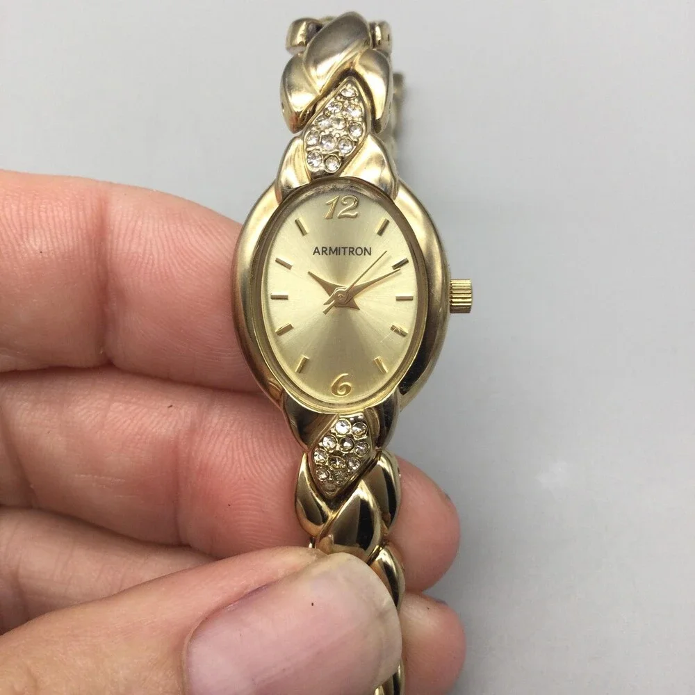 Armitron Womens Watch 19mm Gold Tone Oval Braided Bracelet New Battery 7
